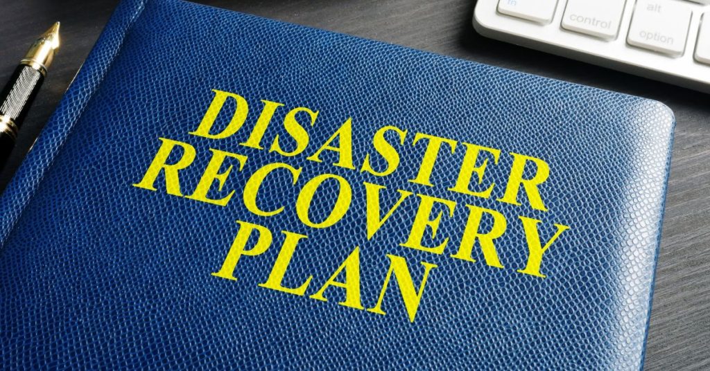 a blue mock up book with 'disaster recovery plan' as a title